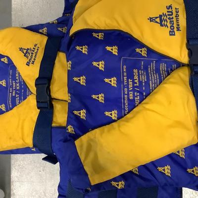 2 Menâ€™s yellow & blue life vests