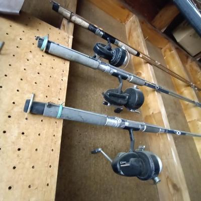 LOT 79 FISHING POLES AND REELS
