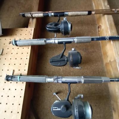 LOT 79 FISHING POLES AND REELS