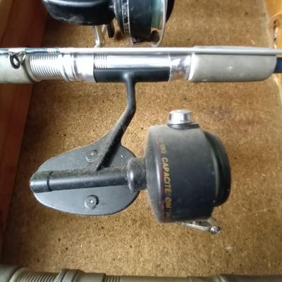 LOT 79 FISHING POLES AND REELS