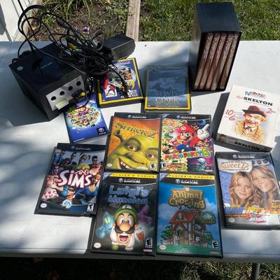 LS17-Nintendo game cube with games and miscellaneous DVDs