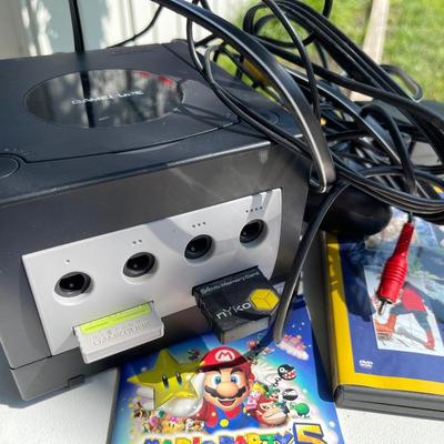 LS17-Nintendo game cube with games and miscellaneous DVDs