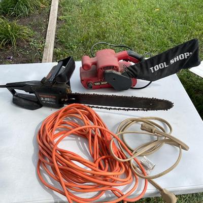 LS27-Chainsaw, belt sander. and cords