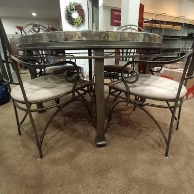 LOT 12 IRON & STONE TOP TABLE AND FOUR IRON CHAIRS