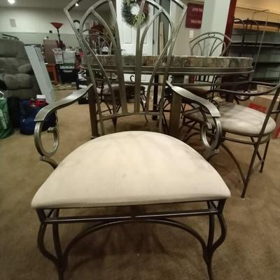 LOT 12 IRON & STONE TOP TABLE AND FOUR IRON CHAIRS