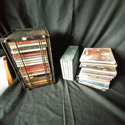LOT 89 MUSIC ON CD AND CAGE HOLDER
