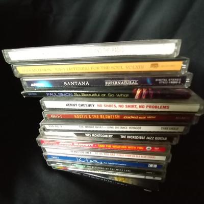 LOT 89 MUSIC ON CD AND CAGE HOLDER
