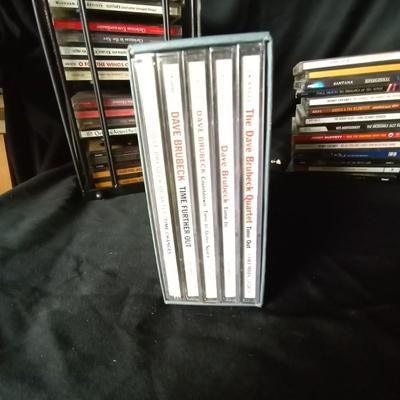 LOT 89 MUSIC ON CD AND CAGE HOLDER