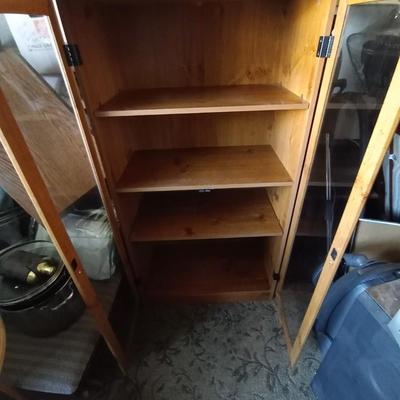 LOT 48 THREE SHELF WOODEN GLASS FRONT CABINET