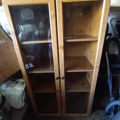 LOT 48 THREE SHELF WOODEN GLASS FRONT CABINET