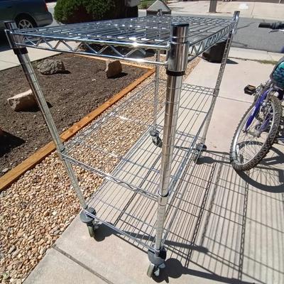LOT 39 TWO SHELF ROLLING WIRE RACK