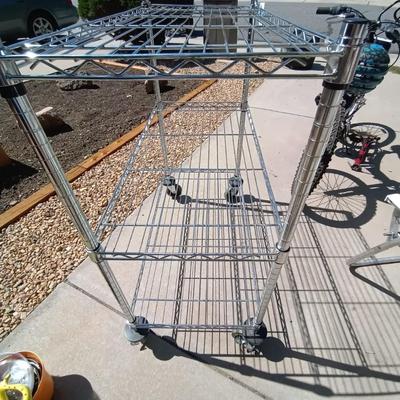 LOT 39 TWO SHELF ROLLING WIRE RACK