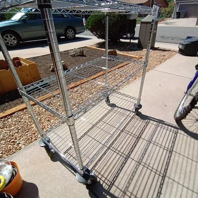 LOT 39 TWO SHELF ROLLING WIRE RACK