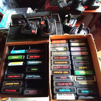 LOT 109 VINTAGE ATARI VIDEO GAME CONSOLE AND GAMES
