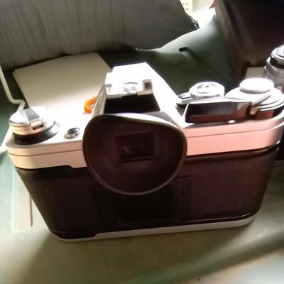 LOT 125 TWO CANON CAMERAS AND LENS