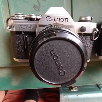 LOT 125 TWO CANON CAMERAS AND LENS