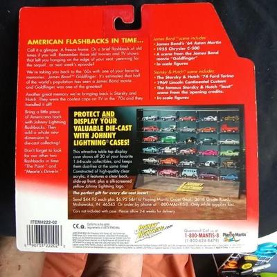 LOT 126 NIB JOHNNY LIGHTNING JAMES BOND 007 AND COLLECTABLE CARS