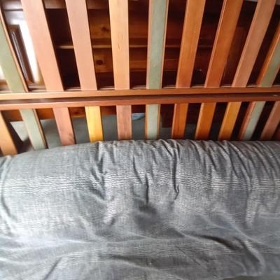 LOT 104 WOODEN FUTON FRAME AND MATTRESS