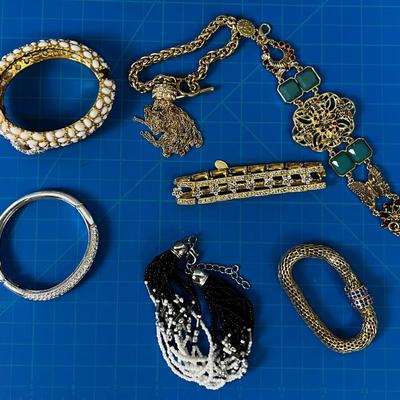 Several Gold and B-Jeweled Costume Bracelets 