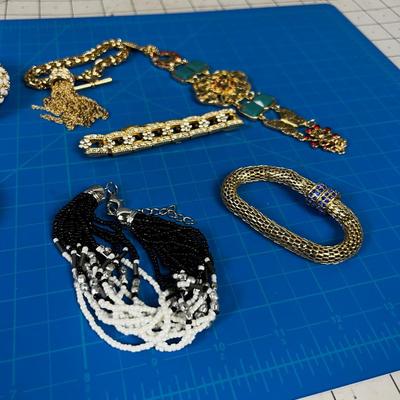 Several Gold and B-Jeweled Costume Bracelets 