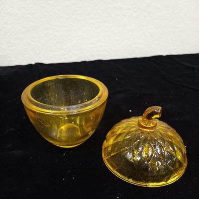 LOT 116  TWO GLASS WINDOW BANKS AND AN AMBER GLASS DISH WITH LID