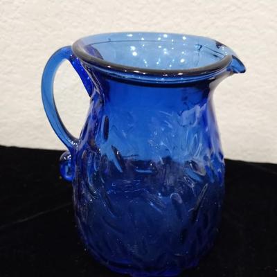 LOT 121  CRYSTAL VASE, BLUE GLASS PITCHER AND FOOTED BOWL
