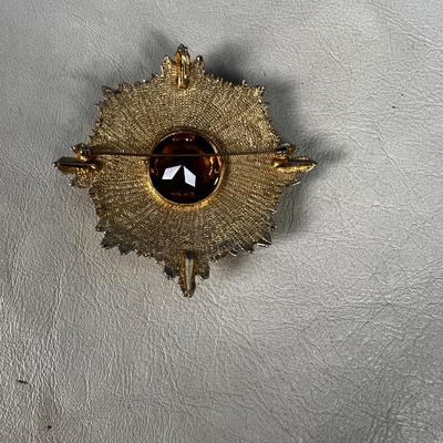 Gold Toned Sun Dial Shape with large Topaz Pin