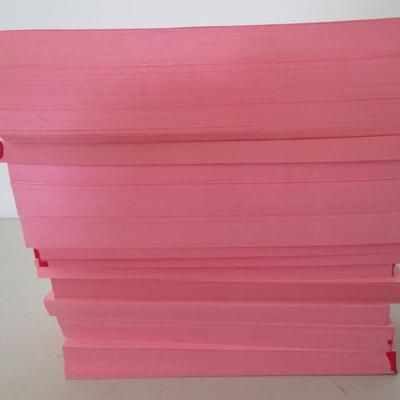 #52 Several Pads of pink paper 