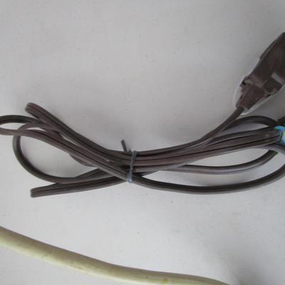 #56 3 Surg protectors and 1 extention cord