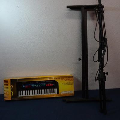 LOT 191 KEYBOARD, KEYBOARD STAND AND MIC STAND