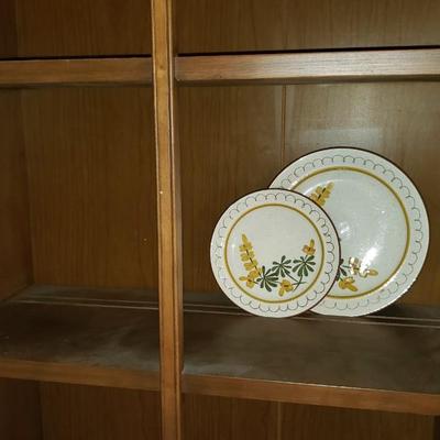 Tall vintage display shelf with dish display grooves