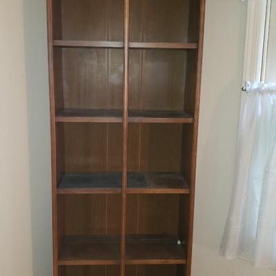 Tall vintage display shelf with dish display grooves