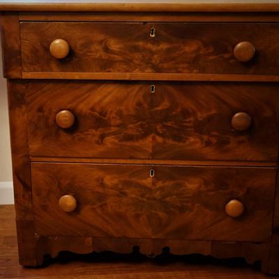 19th CENTURY CHERRY & FLAME MAHOGANY THREE DRAWER BUREAU W/ DROP LEAF SIDES