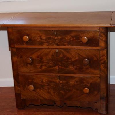19th CENTURY CHERRY & FLAME MAHOGANY THREE DRAWER BUREAU W/ DROP LEAF SIDES
