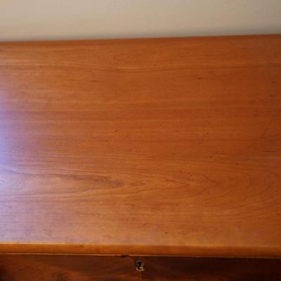 19th CENTURY CHERRY & FLAME MAHOGANY THREE DRAWER BUREAU W/ DROP LEAF SIDES