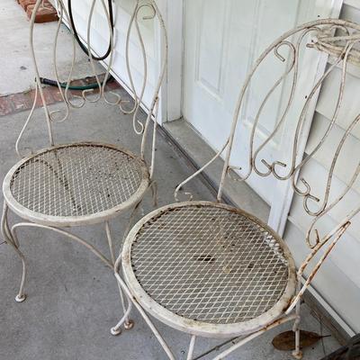 Two Vintage Metal Bistro Chairs