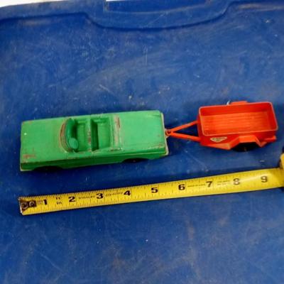 LOT 114  OLD TOOTSIE TOY CAR AND U-HAUL TRAILER