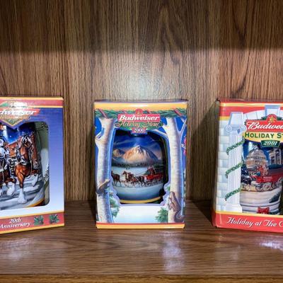 LOT 43 BOXED ORIGINAL BUDWEISER STEINS FROM  1999-2000-2001   (Located in Basement)