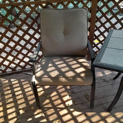 LOT 25 TWO PATIO CHAIRS AND TILE TOPPED PATIO TABLE