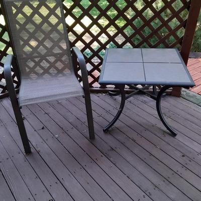 LOT 27 TWO PATIO CHAIRS AND A TILE TOP TABLE