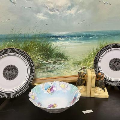 Vintage Plates and Marble Hold Books