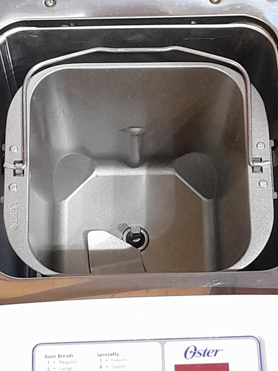 LOT 55 OSTER AUTOMATIC BREAD MAKER | EstateSales.org