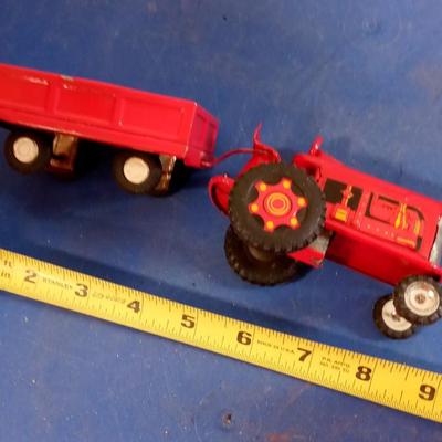 LOT 140  SMALL MARX TIN LITHO TRACTOR AND TRAILER
