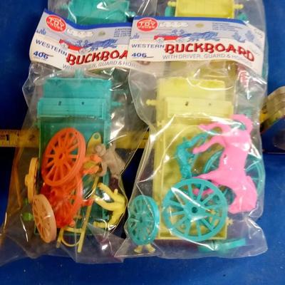 LOT 142  FOUR VINTAGE TOY HOUSE BUCKBOARDS