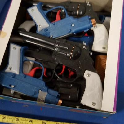 LOT 152  BOX TOY CAP GUNS AND CAPS