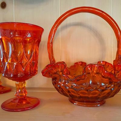 Orange glass goblets with glass basket