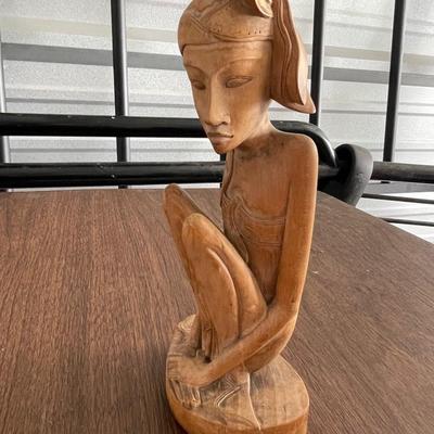Carved wooden statue of Nymph