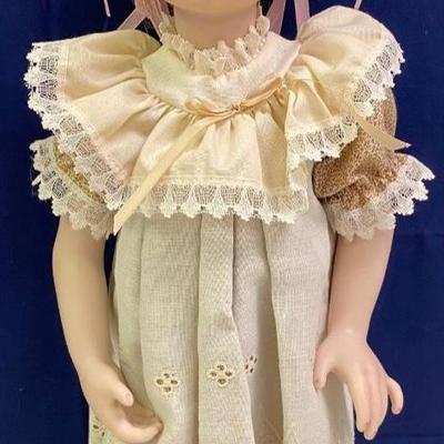 Head is Loose. Red Head Doll