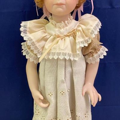 Head is Loose. Red Head Doll