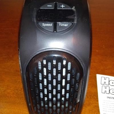 LOT 125  HANDY HEATER AND BATTERY OPERATED PERSONAL FAN